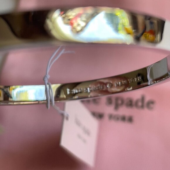 NWT Kate Spade Silver Heritage Spade Logo Metal Button Bangle Bracelet Dust Bag - Picture 9 of 10